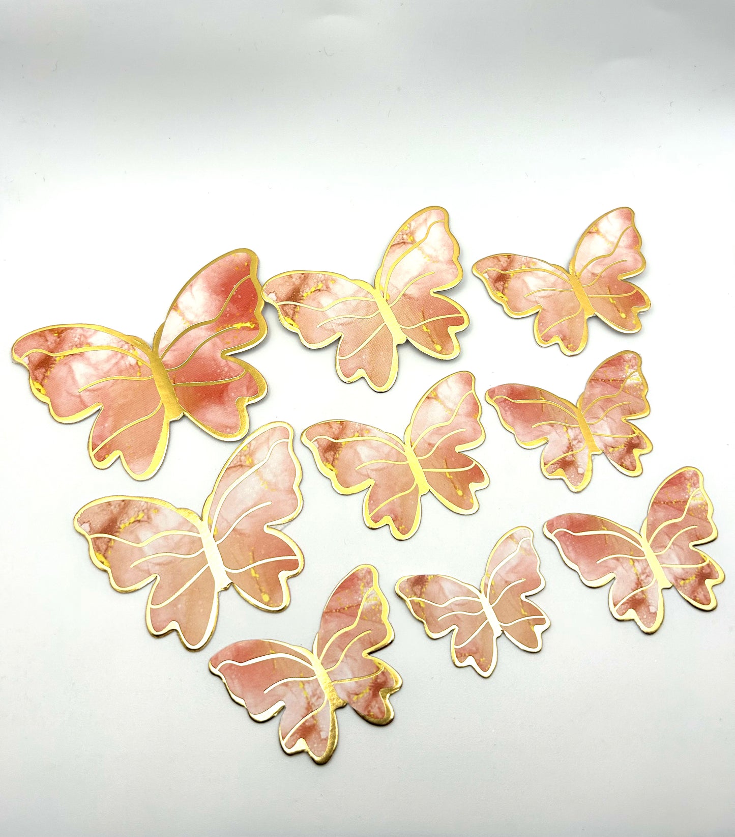 Marbled peach and white butterflies