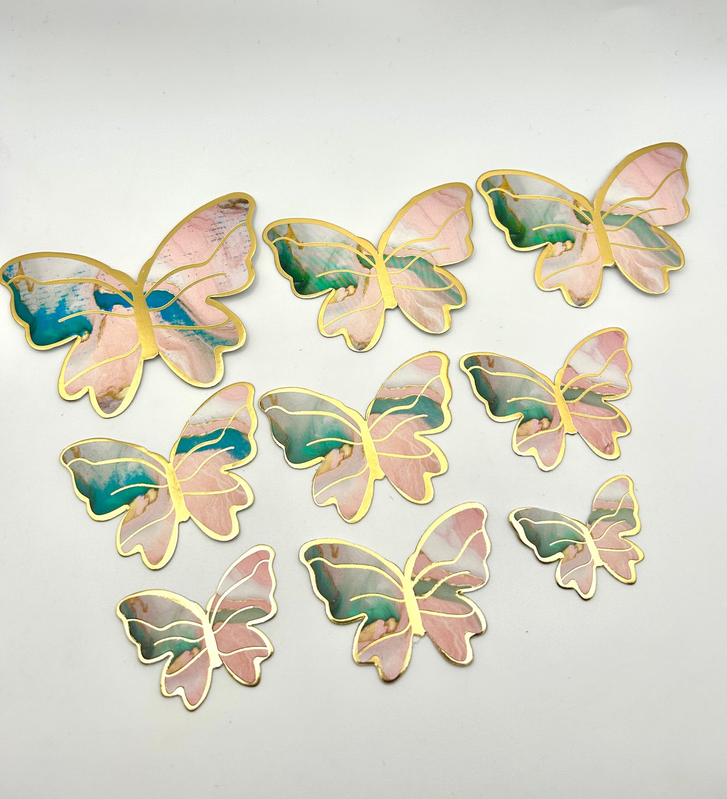 Marbled teal and pink butterflies