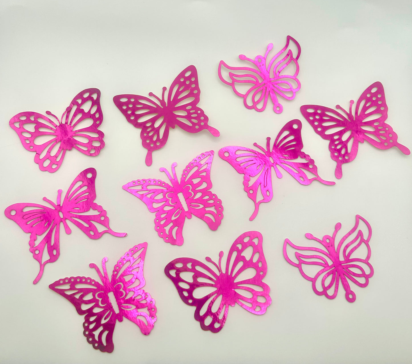 Metallic hot pink butterflies