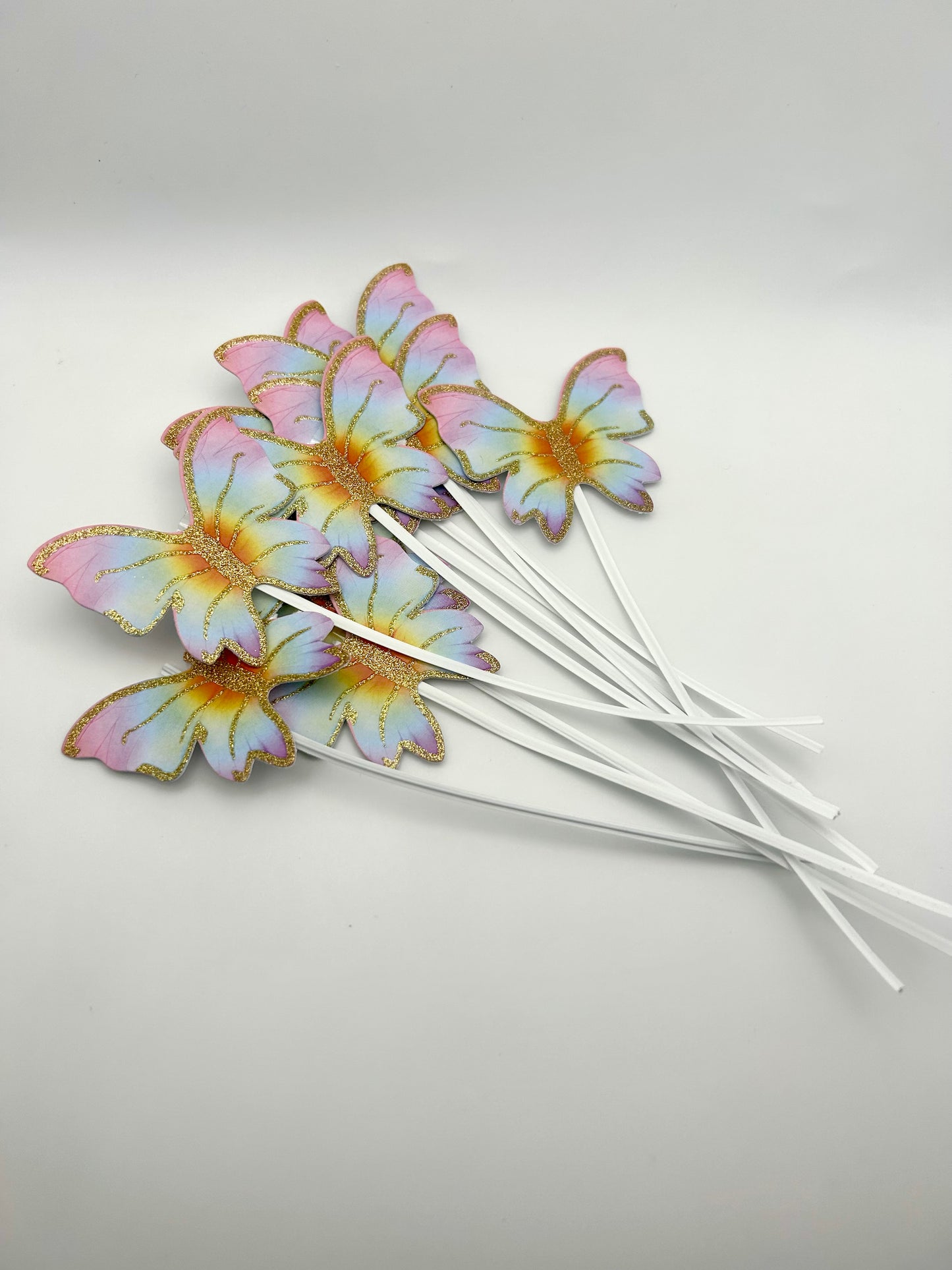 Rainbow butterflies with stick