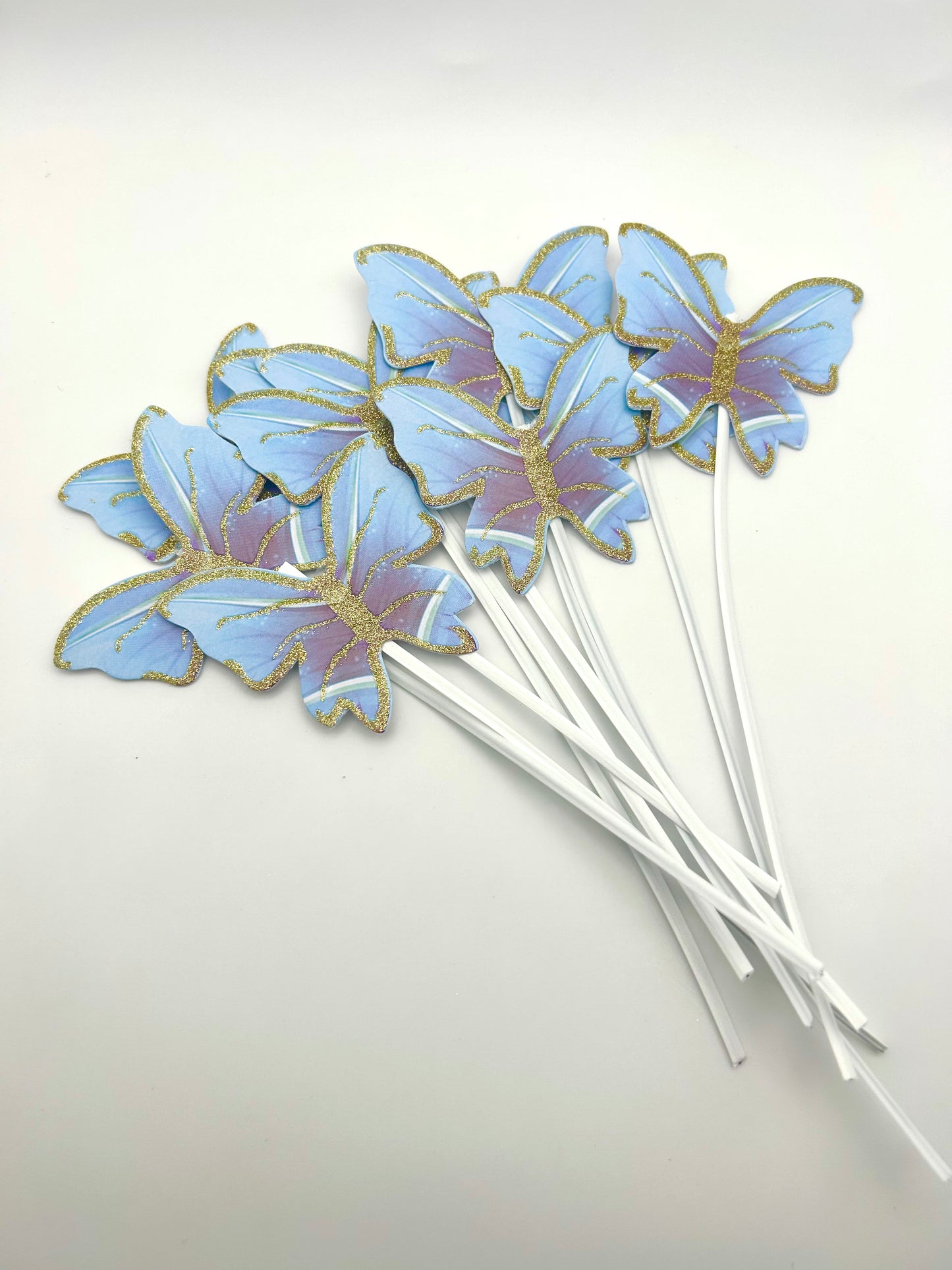 Blue butterflies with stick