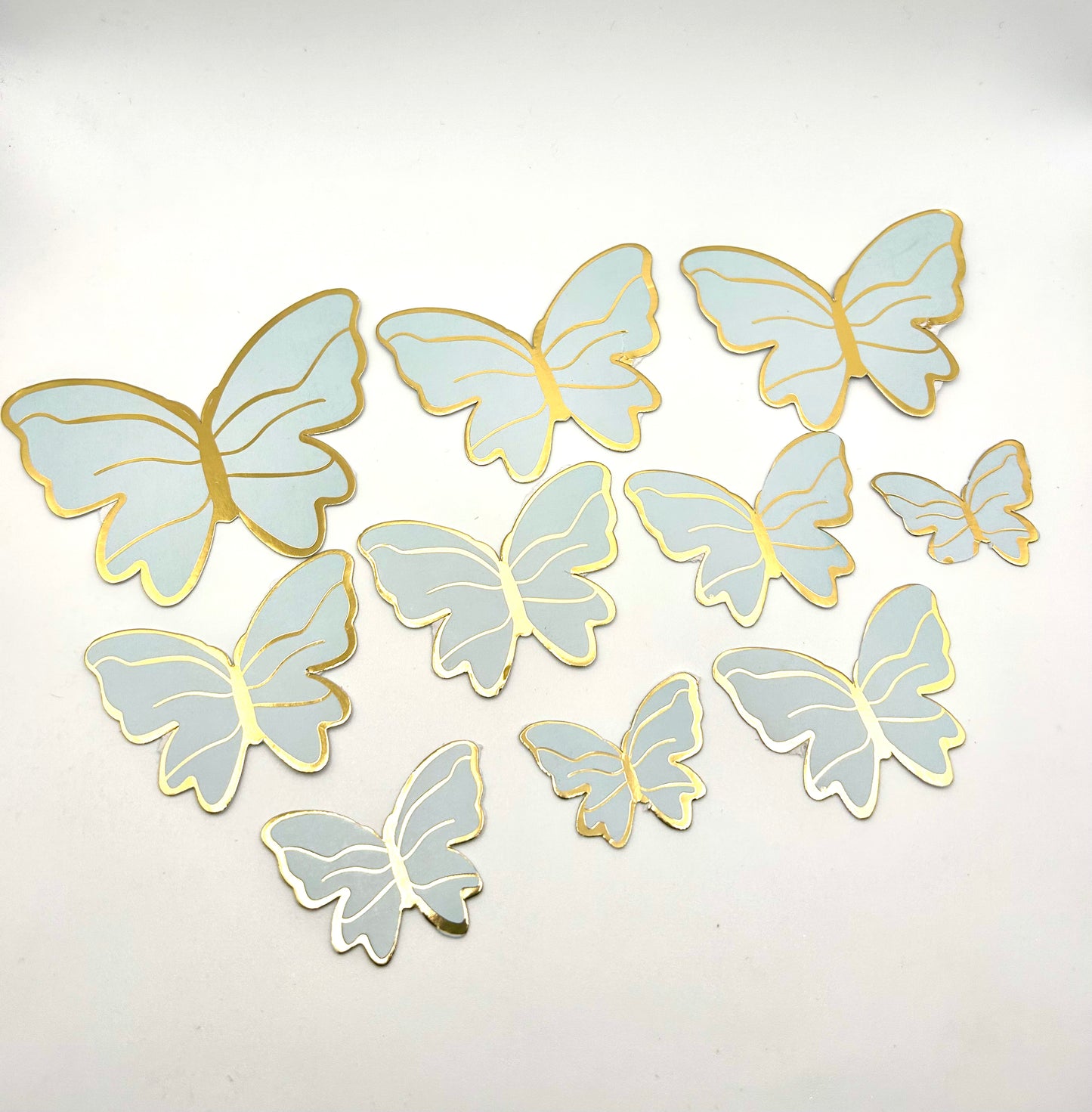 Baby blue and gold butterflies