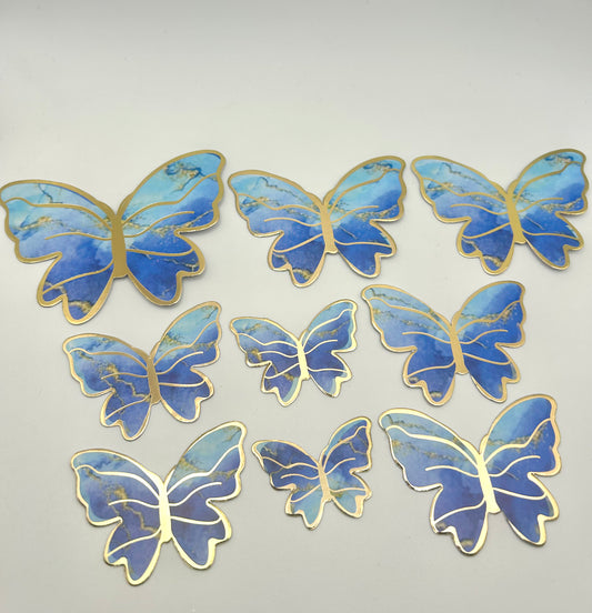 Marbled blue and gold butterflies