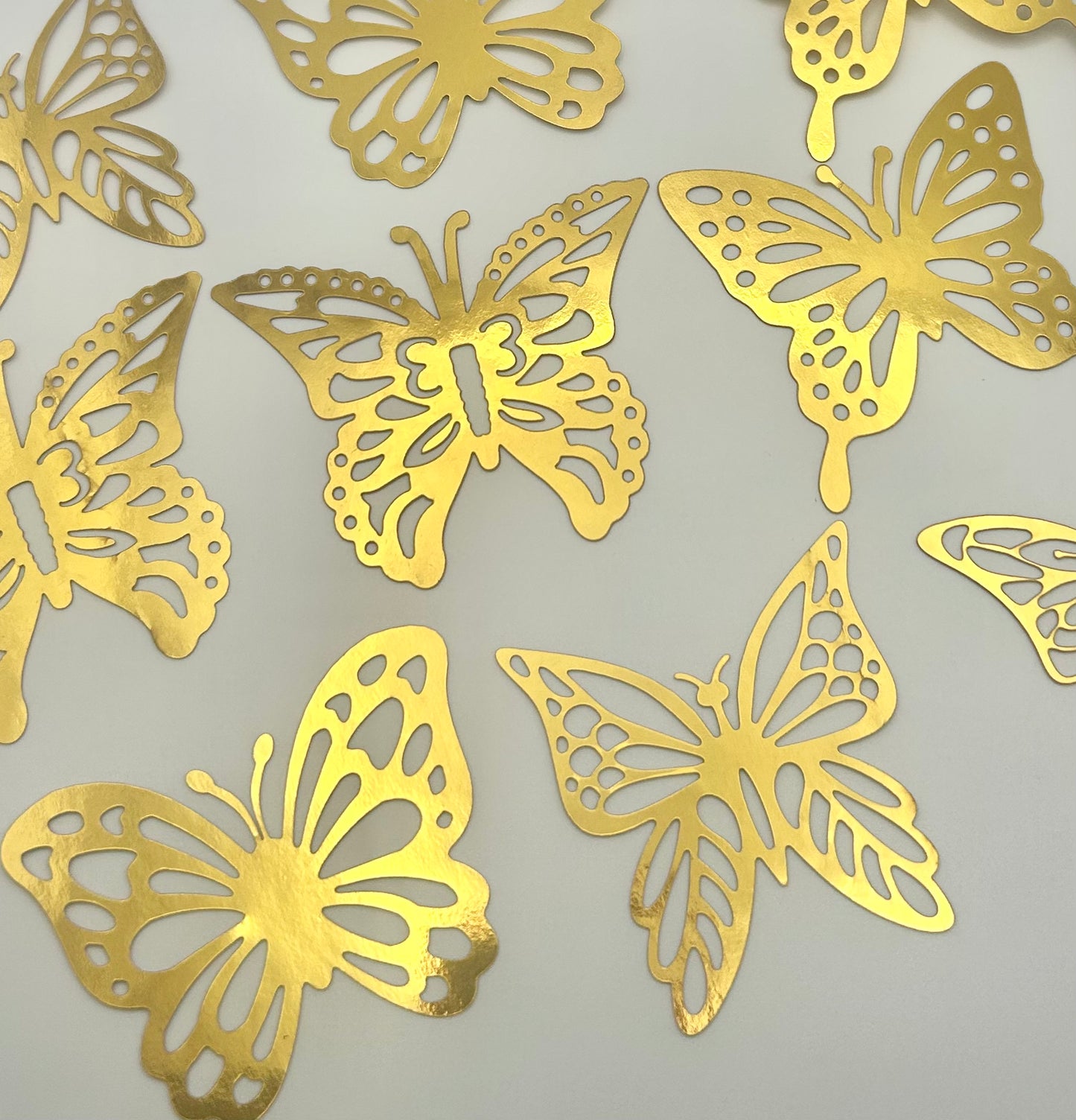 Metallic gold butterflies
