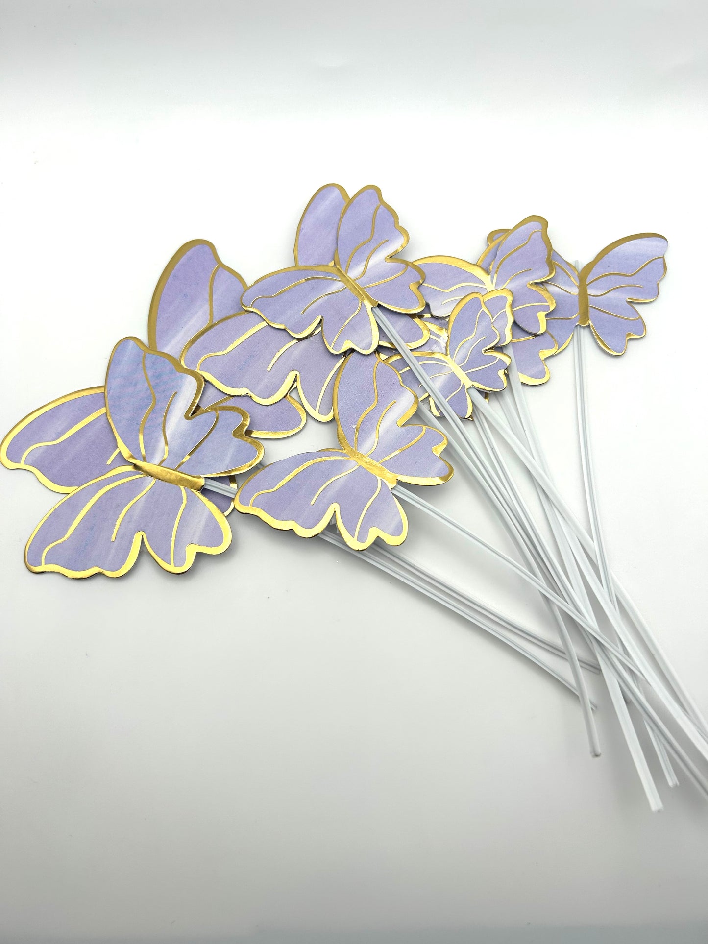 Purple butterflies with stick