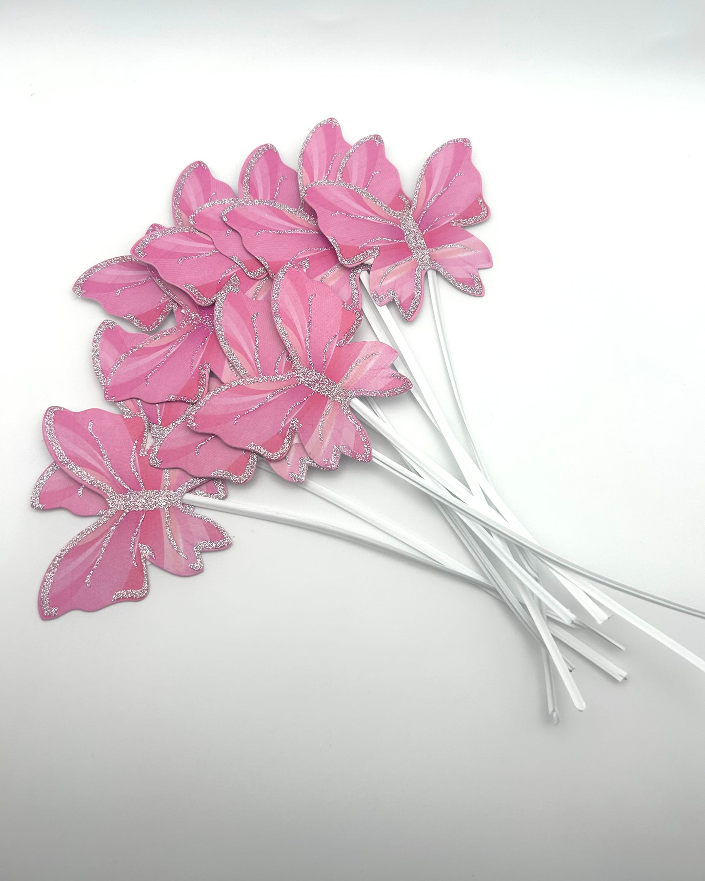 Pink butterflies with stick
