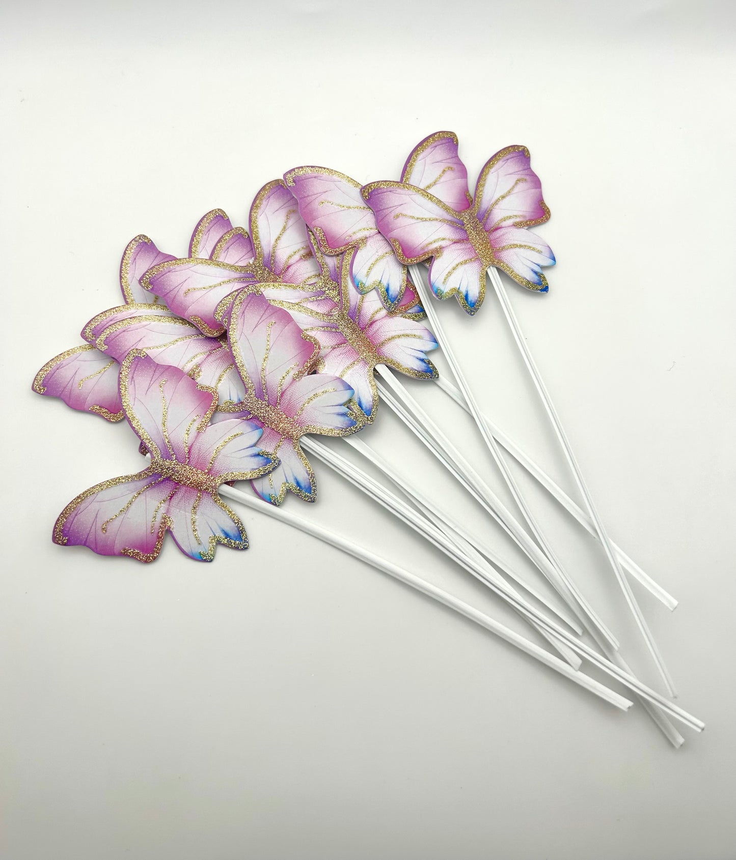 Purple white butterflies with stick
